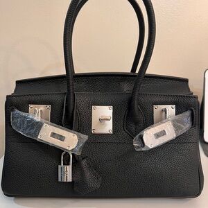 Genuine Leather Shoulder Bag, size 29, with silver hardware.